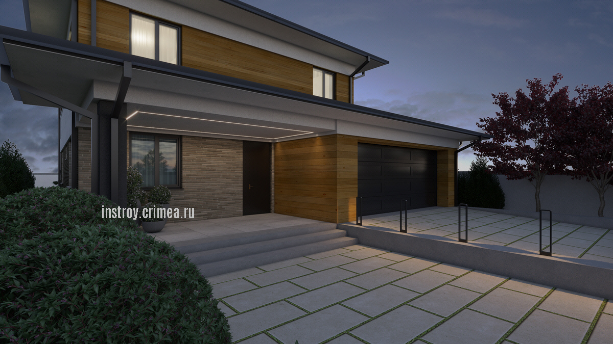 Ночной экстерьер дома с гаражем из ракушки в Симферополе